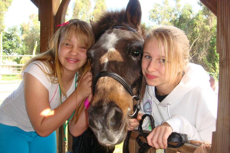 Florida Equine Assisted Therapy_Horses Healing Hearts_Tiff Friend and Horse.jpg